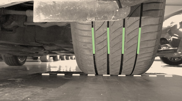 Picture showing tires' threads being read by a scanner